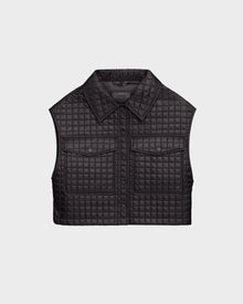The Rudsak SOLSA - 8124048 Black is a womens sleeveless cropped quilted vest with Sorona eco-fill, a collared neckline, front button closure, and two chest pockets, shown against a plain light background.