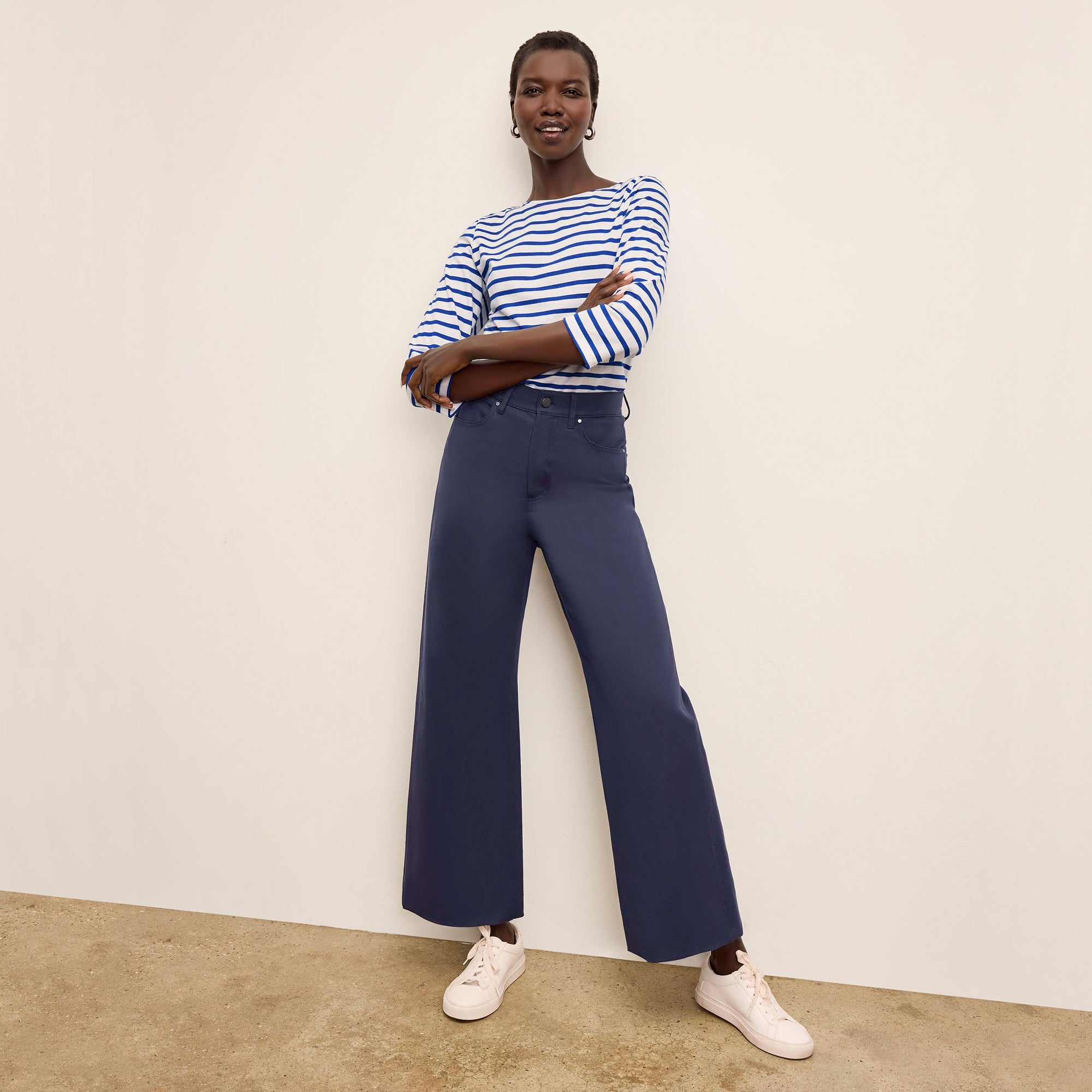 Front image of a woman standing wearing the Milo Jean in ink | Lead