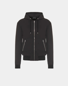 The RUDSAK ROGER - U523507 Black M is a unisex zip-up hoodie with two front zippered pockets and hood drawstrings, ideal for urban style. Shown on a plain white background.