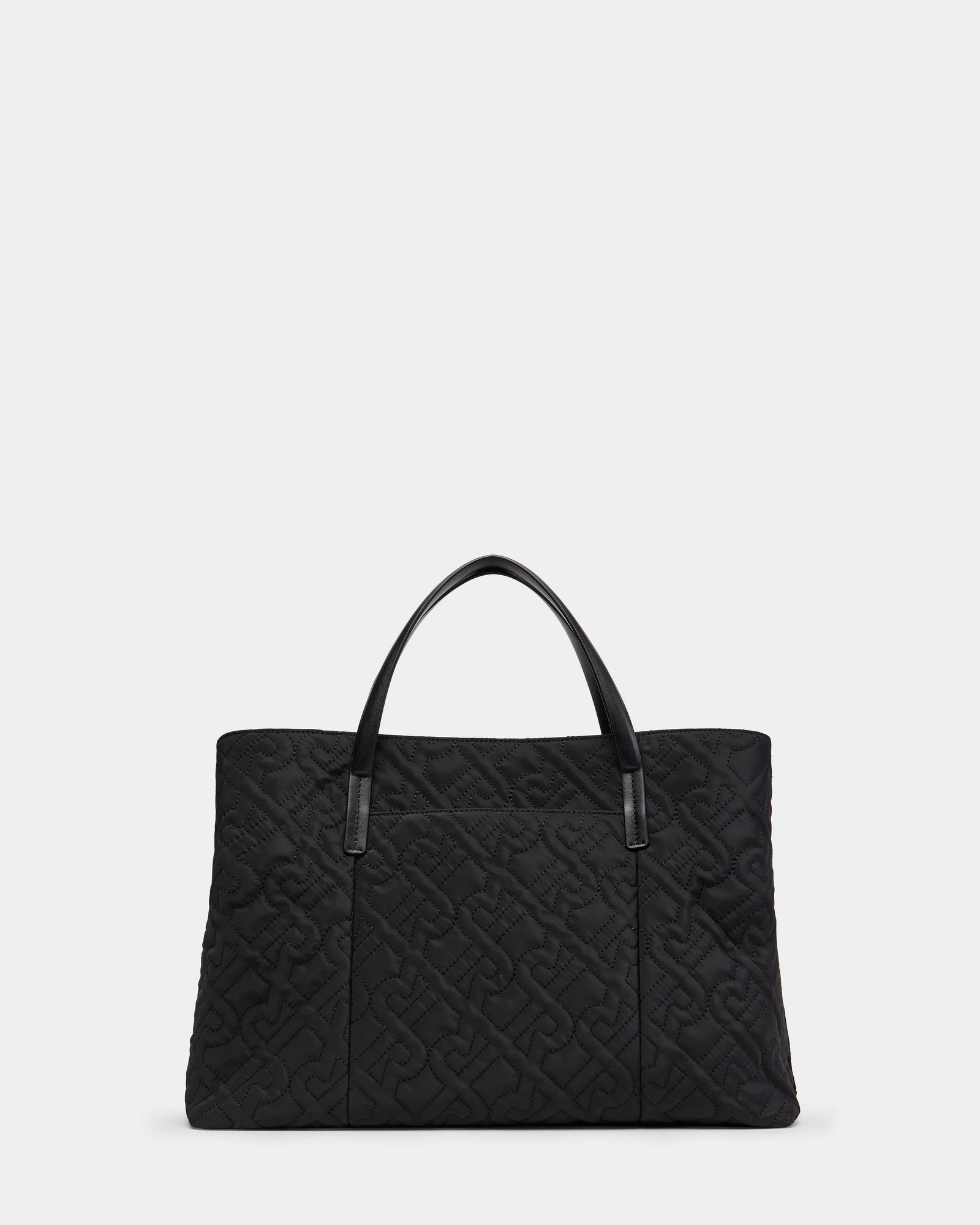 The ASMINE - L325005 Black by Rudsak is a large black quilted monogram tote with two black handles and an embossed geometric pattern, shown on a plain white background.