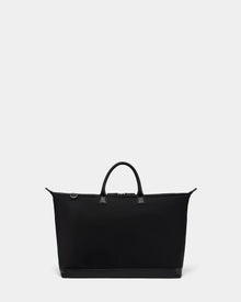 The Rudsak DUBLIN - 9324514 Black is a sleek unisex weekender tote with a sturdy handle, ideal for stylish getaways.
