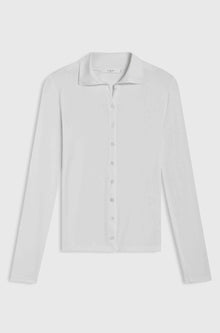 White button up shirt against a light grey background