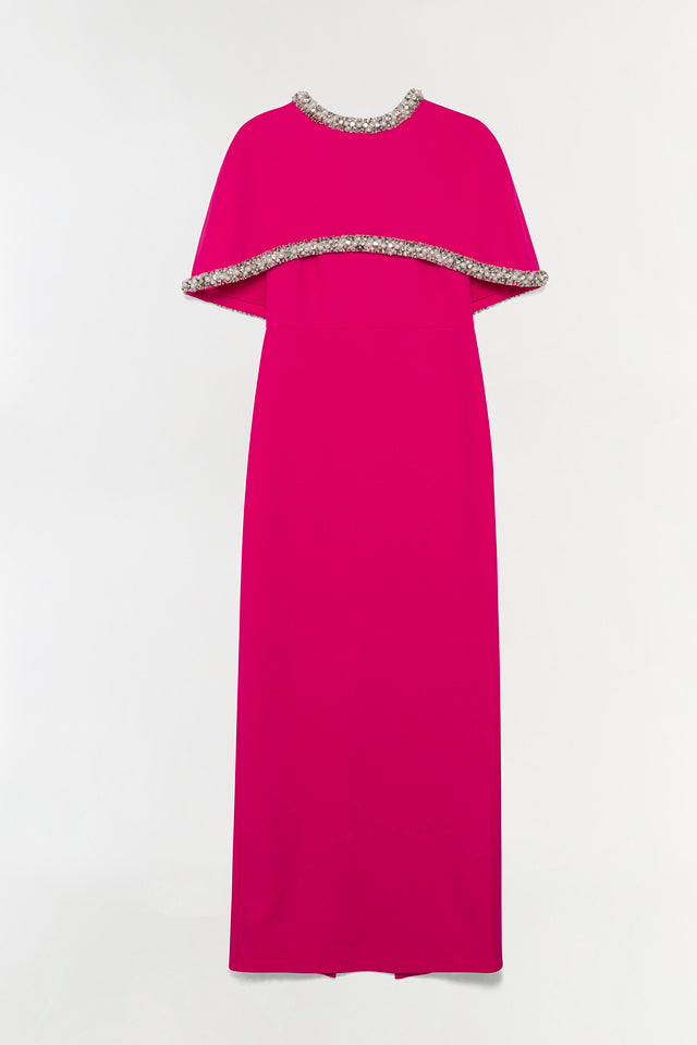Hot pink floor-length gown with detached cape featuring jeweled trim around neckline and cape edge.