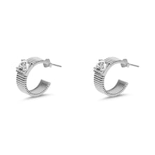 cz huggie earrings with silver finish