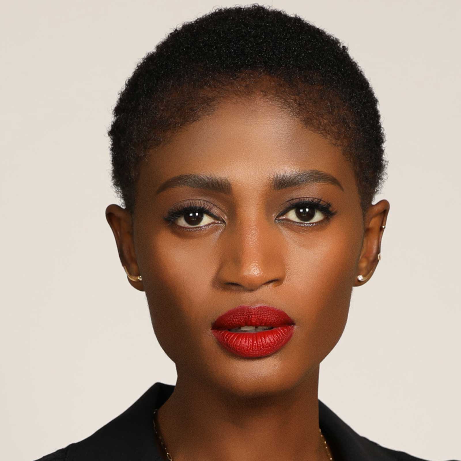 14k gold Curved Quill Climber Earrings on model