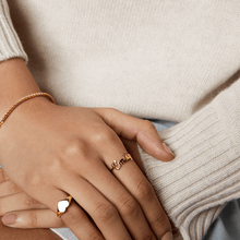 gold pinky heart ring