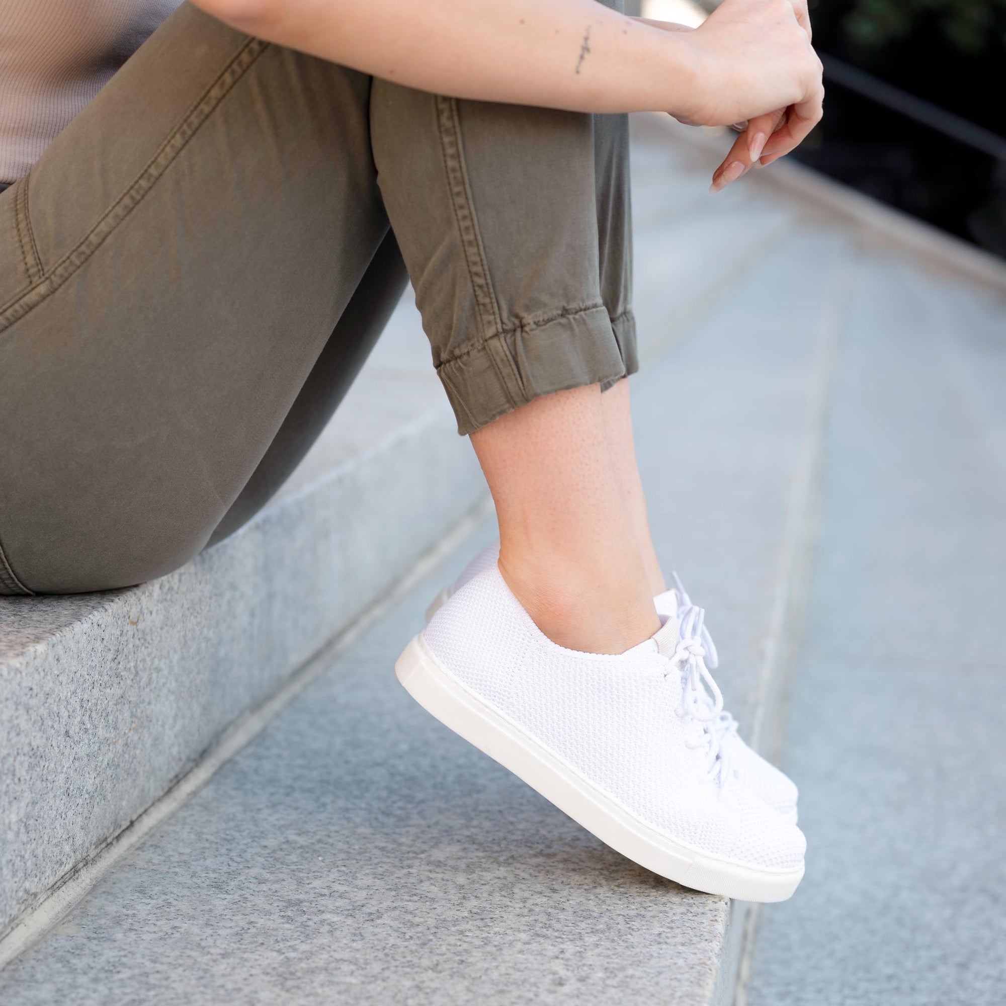 Image 1 Women's Kickaround Sneaker White Nisolo on Model