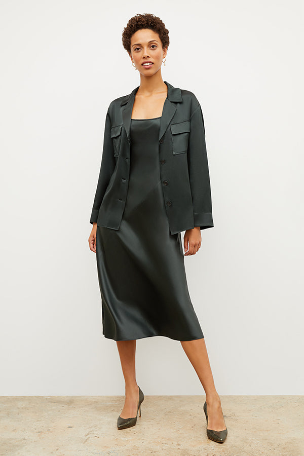 Image of a woman wearing the Alyssa Jacket in Hunter | Exclude | Grid